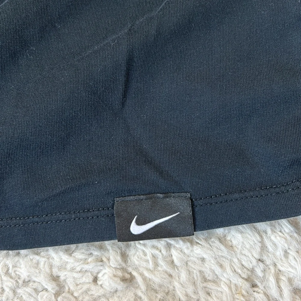 NIKE M LeBron James black shirt  with orange emblem and with bright sleeves
